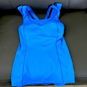 Lululemon tank. Blue with snakeskin bra strap size 6 like new without tags.